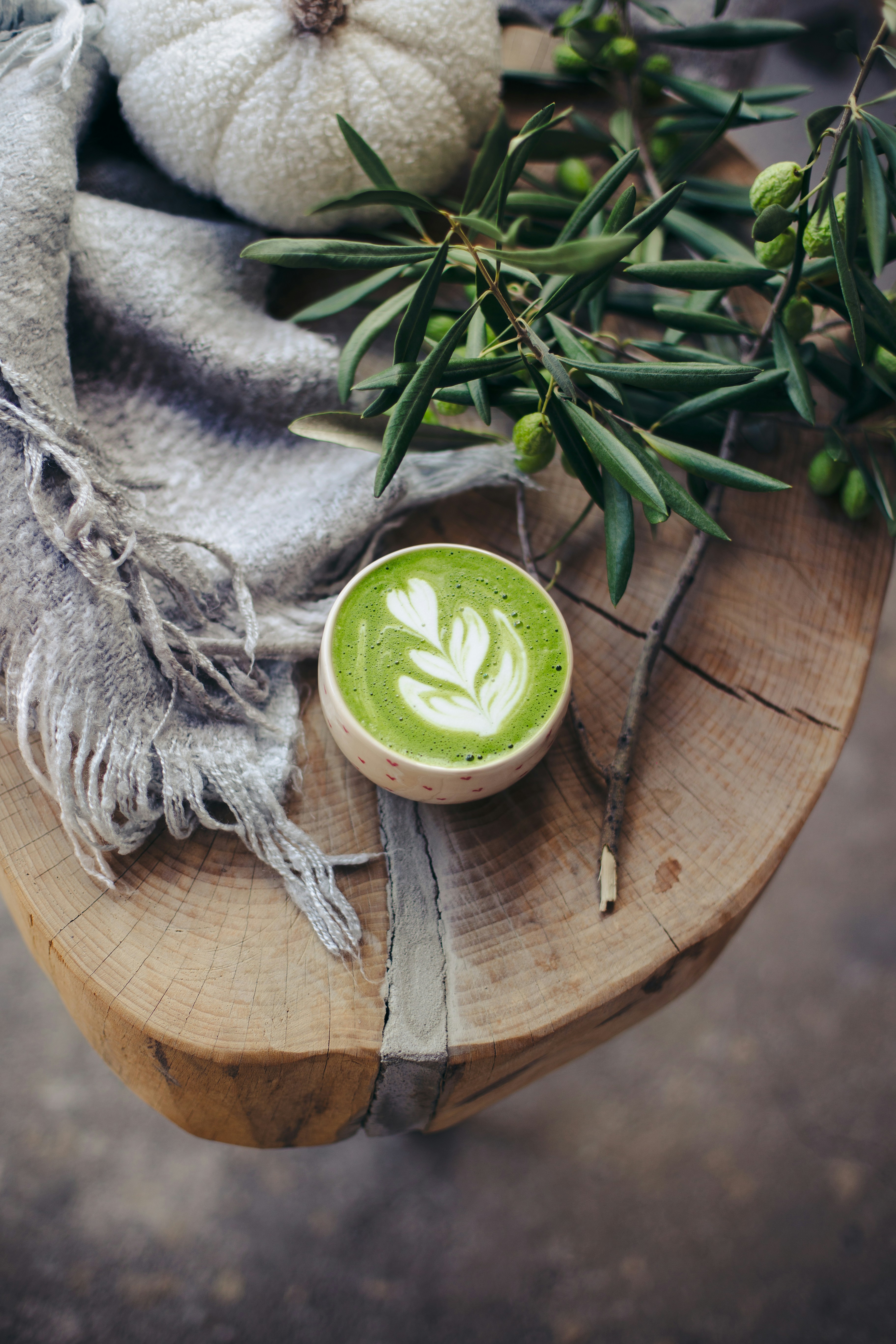 Cozy autumn scene with a warm bowl of matcha